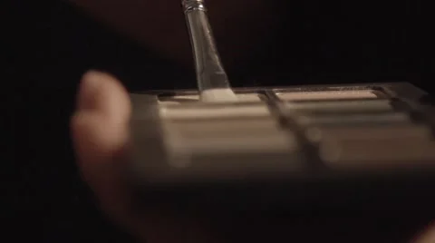 Using cosmetics in slow motion Stock Footage 67860964