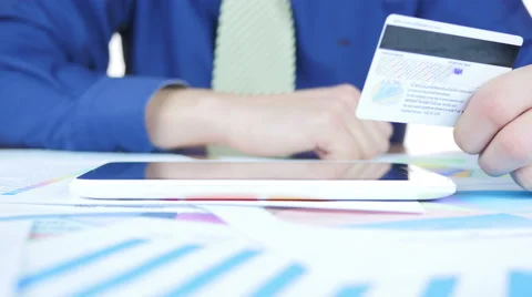 Using Credit Card And Tablet In Office Businessman 動画素材 64052308