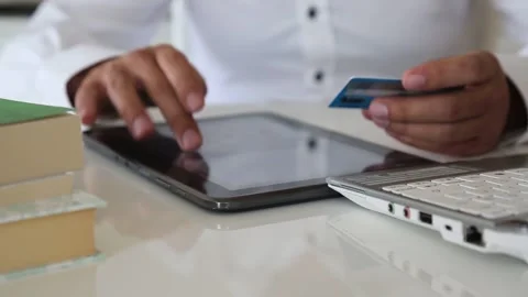 Using Credit Card for Digital Payment on Tablet Stock Footage 346184057
