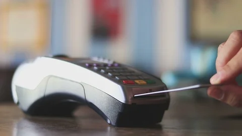 Using a credit card reader Video stock 107257731