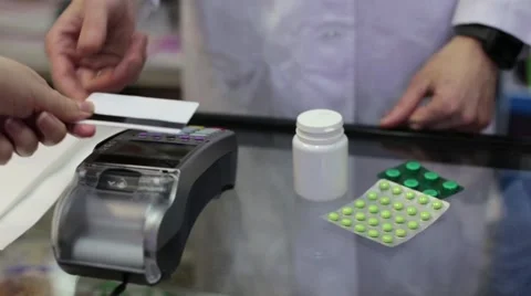 Using Credit Card Terminal with PIN in Pharmacy Stock Footage 63071912