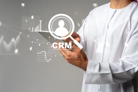 Using CRM software for customer management in a modern business setting Stock Photos
