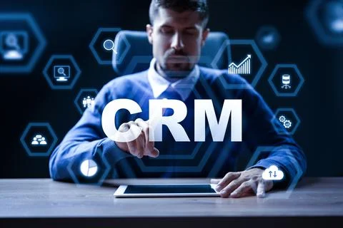 Using CRM software to manage customer data and improve business relations in an Stock Photos