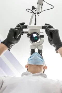 Using a dental microscope Foto stock