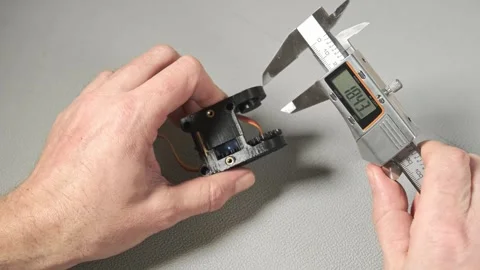 Using a digital caliper. precision measurement, prototyping, quality contro.. Stock Footage 340294936