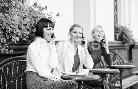 Using digital devices. Group women cafe terrace. Mobile addicted. Mobile Stock Photos