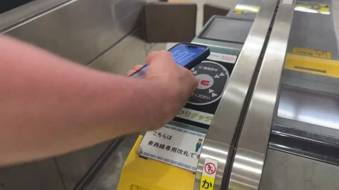 Using Digital Suica Card at Tokyo Subway Gate Stock Footage 336558224