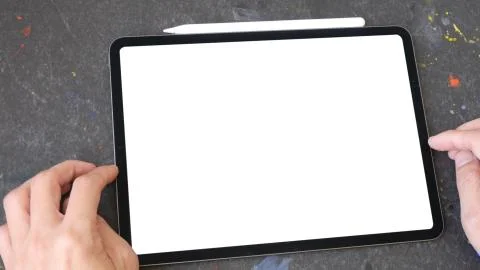 Using digital touchscreen tablet with stylus pen and smart keyboard Stock Photos