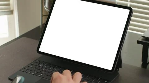 Using digital touchscreen tablet with stylus pen and smart keyboard Stock Photos