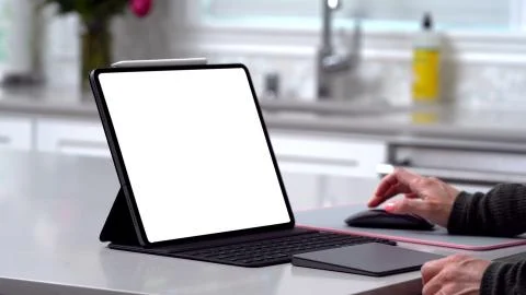 Using digital touchscreen tablet with stylus pen and smart keyboard Stock Photos