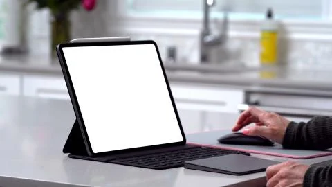 Using digital touchscreen tablet with stylus pen and smart keyboard Stock Photos