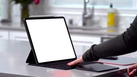 Using digital touchscreen tablet with stylus pen and smart keyboard Stock Photos