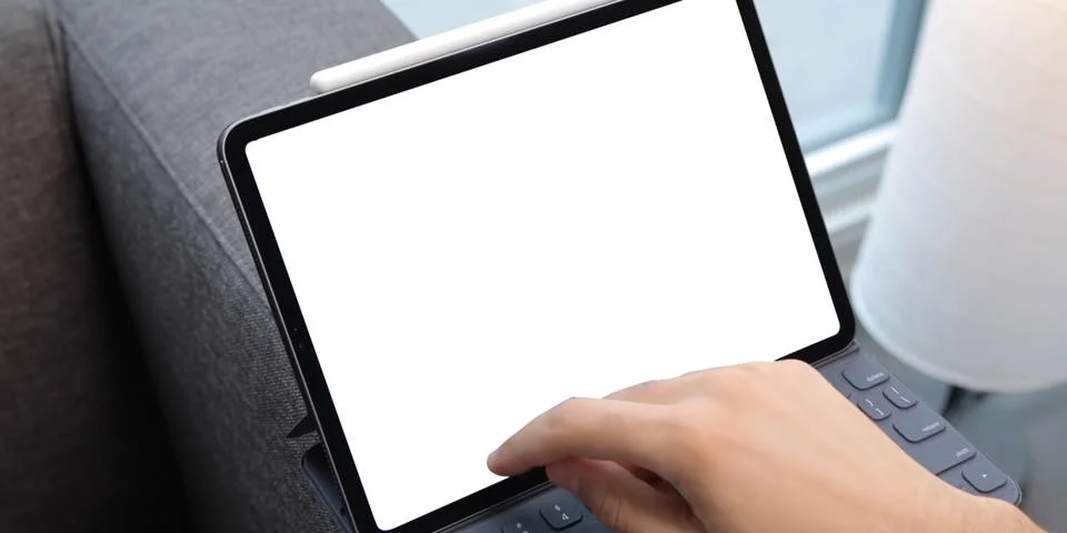 Using digital touchscreen tablet with stylus pen and smart keyboard Stock Photos