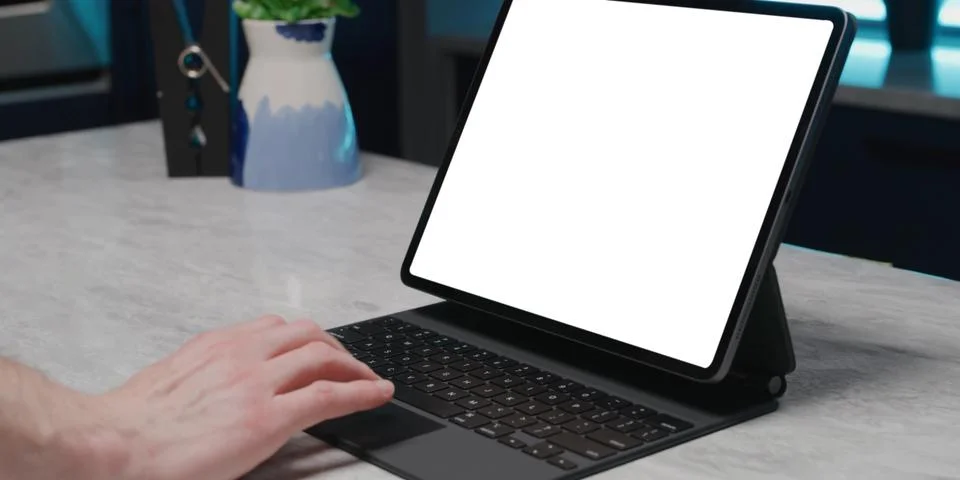 Using digital touchscreen tablet with stylus pen and smart keyboard Stock Photos