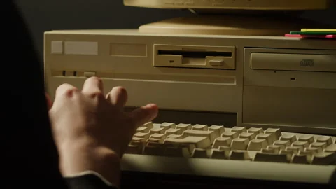 Using diskette FDD for old computer close-up. Hand inserting and ejecting Floppy Stock Footage 271646953