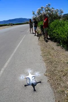 Using drone and video camera for shooting on the road Stock Photos