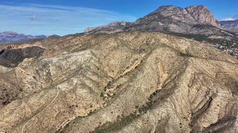 Using Drone Technology To Document Eroded Slopes And Winding Trails In Remote Stock Footage 342399455