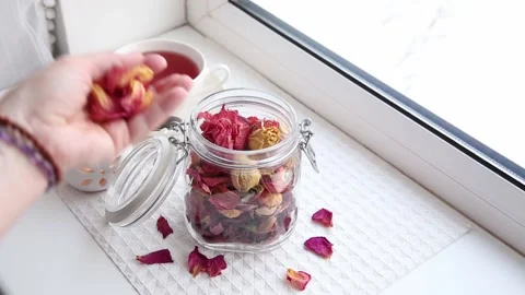 Using dry rose petals to make rose potpourri wich is great for home smell. Video stock 147329867