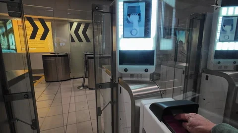 Using the e-passport machines. Stock Footage 278994042