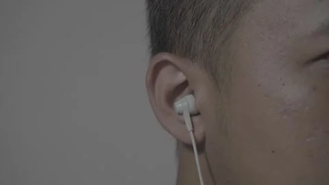 Using earphones Stock Footage 317291589
