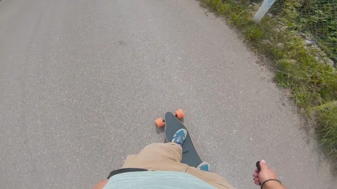 Using electric skateboard on the road and riding fast Stock Footage 116209926