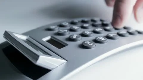 Using Electronic Calculator Stock Footage 12551194