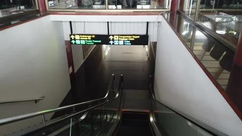 Using the Elevator to The Baggage Claim at Soekarno Hatta Airport Stock Footage 130221641