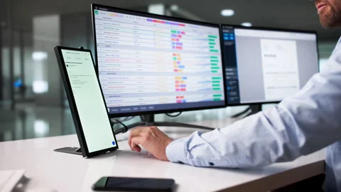 Using Email App On Secondary Screen While Doing Business Report Stock Footage 328403833