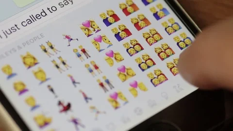 Using emoji keyboard on mobile phone Stock Footage 73691828