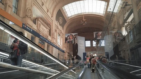 Using escalator in Milan Central railway station (Stazione Milano Centrale) Stock Footage 108453688