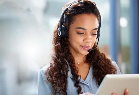 Using every resource to solve your problems. Cropped shot of an attractive yo Stock Photos