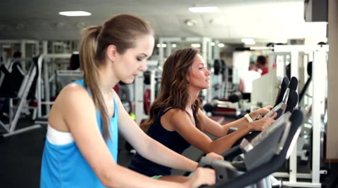 Using Exercise Bikes Stock Footage 42974337