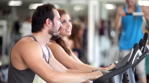 Using Exercise Bikes Stock Footage 42974380