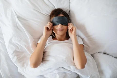 Using eye mask during sleep increseas muscle relaxation Stock Photos