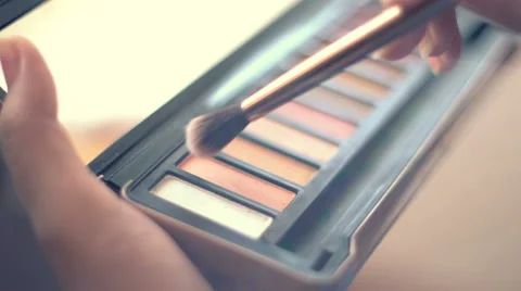 Using eye shadow. Closeup shot, 4k UHD (3840x2160) Stock Footage 60975107