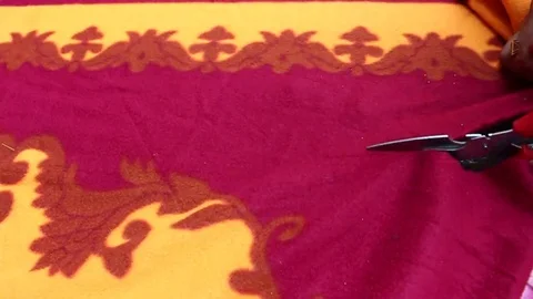 Using fabric shears Stock-Footage 69186454