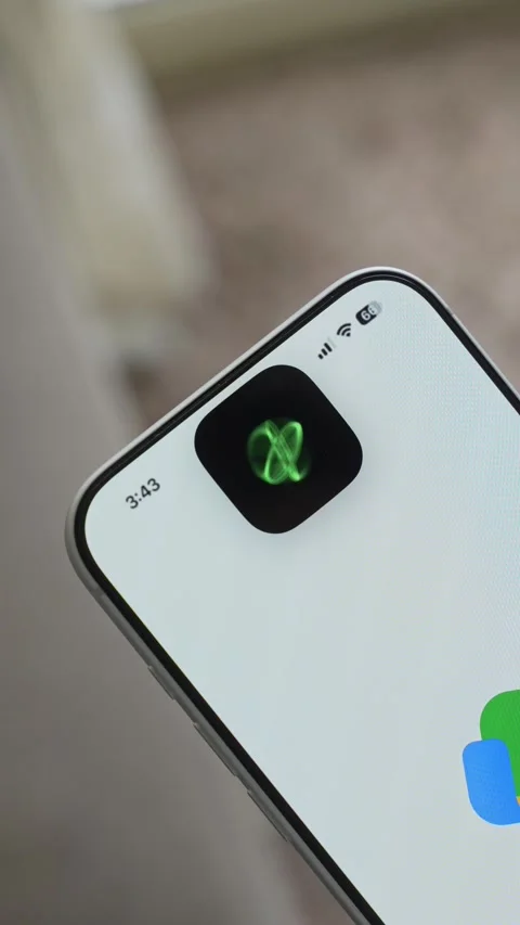 Using Face ID on an iPhone for unlocking a banking app on a smartphone Stock Footage 334016843