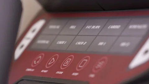 Using fat burn preset training program on the elliptical trainer Video stock 75811787