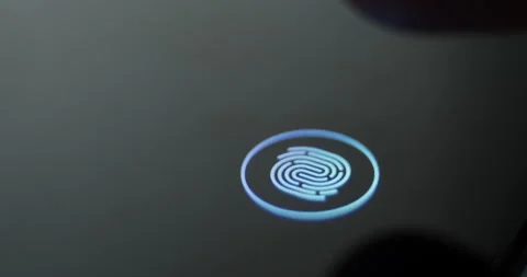 Using Fingerprint Biometrics Sensor on Smartphone to Unlock Device Stock Footage 249097721