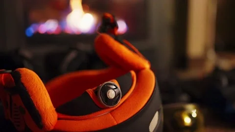 Using a fireplace to dry gloves in winter ski season Stock Footage 145553049