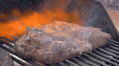 Using a Flame Thrower to Sear a Side of Beef in Slow Motion Stock Footage 104162260