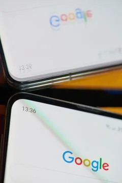 Using google browser application on smartphone Stock Photos