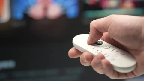 Using a Google Chromecast Remote Control on a TV 스톡 동영상 255098864