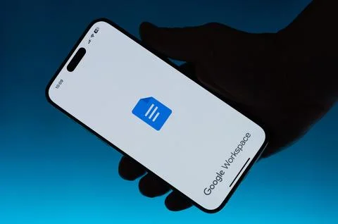 Using Google workspace app on smartphone Stock Photos