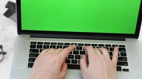 Using green screen laptop Stock Footage 76810224