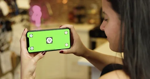 Using a green screen phone in an apartment kitchen Stock Footage 96674921