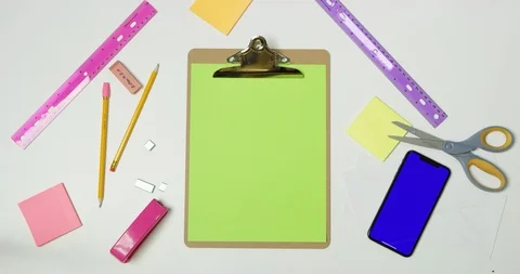 Using green screen phone on a arts and crafts white table Stock Footage 97482620