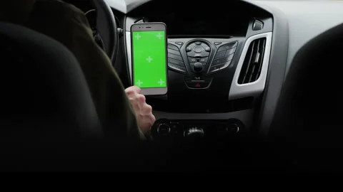 Using a green screen smartphone inside a car Stock Footage 280464029