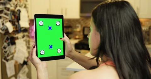 Using a green screen tablet in an apartment kitchen Video stock 96672782