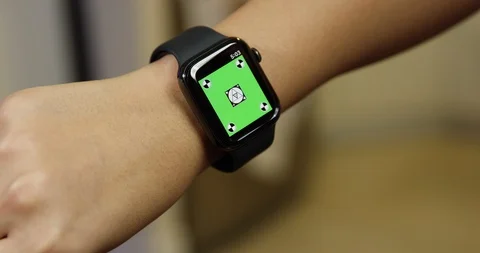 Using a green screen watch in an apartment kitchen Stock Footage 96677216